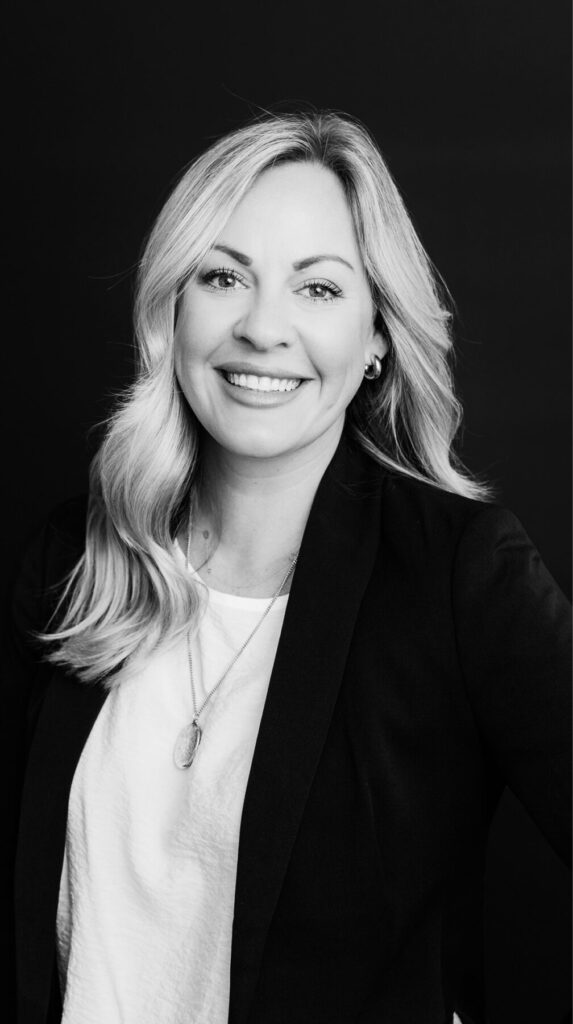 a black and white photo of Caitlin Smith