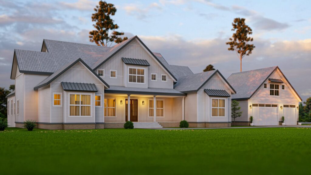 a large white house sitting on top of a lush green field